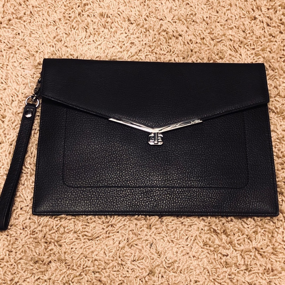 Brand new Botkier flap clutch....